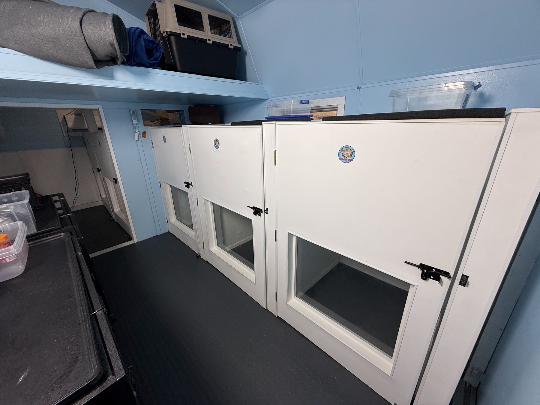 Private indoor sleeping suites with windowed doors